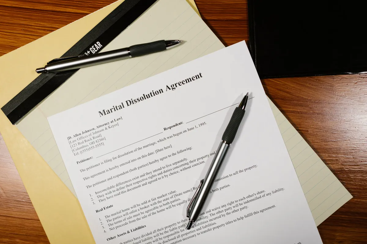 legal documents and pen