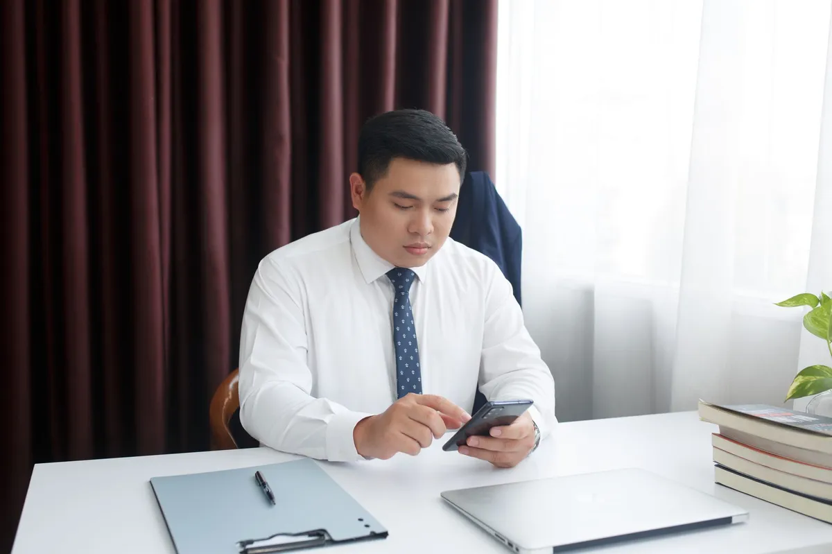 government employee using smartphone