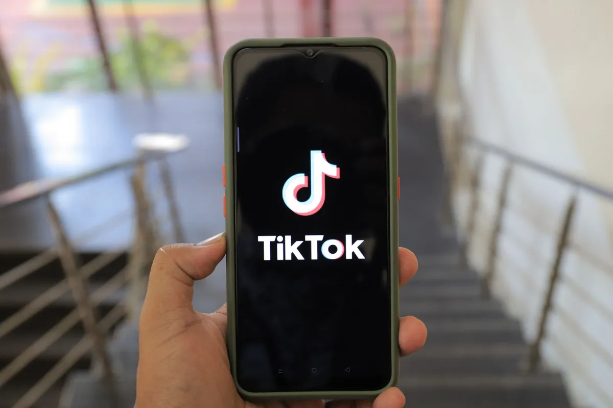 TikTok logo on smartphone screen