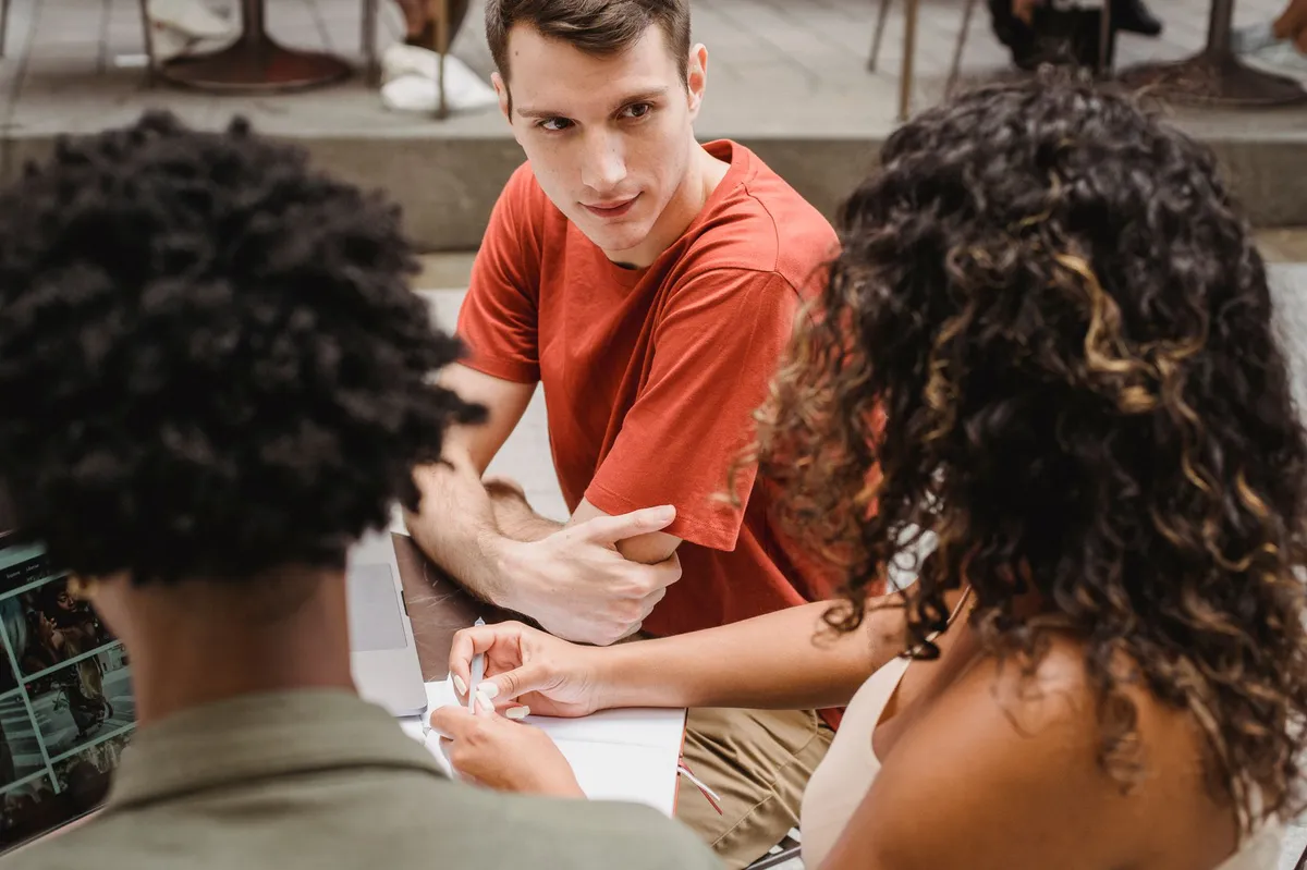 diverse group of friends discussing dating