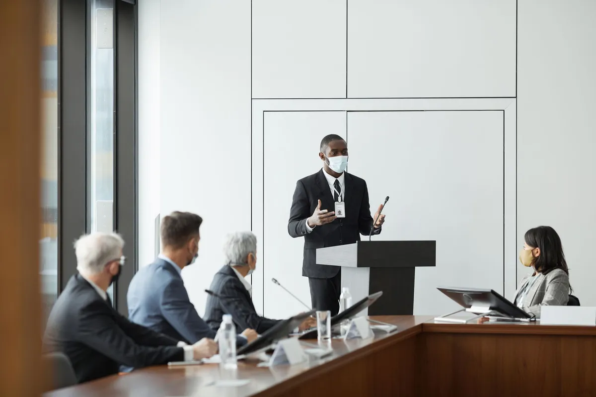 business people discussing regulations