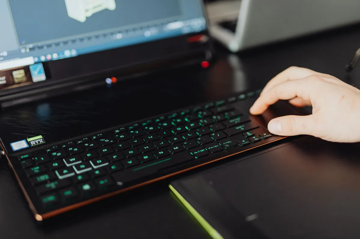 user working at desk with keyboard