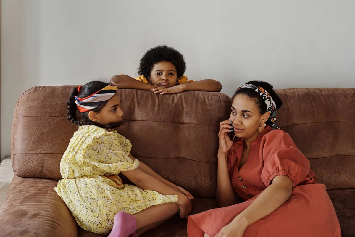 children talking on phone