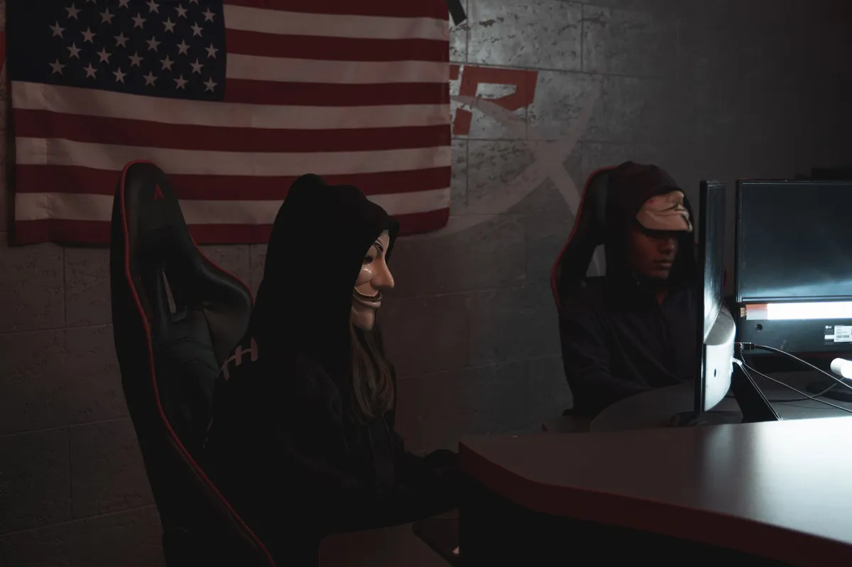 hacker at computer desk