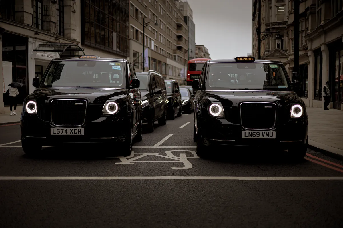 modern city with Uber vehicles