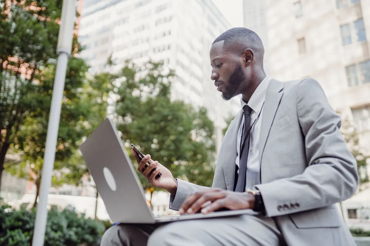 executive using smartphone