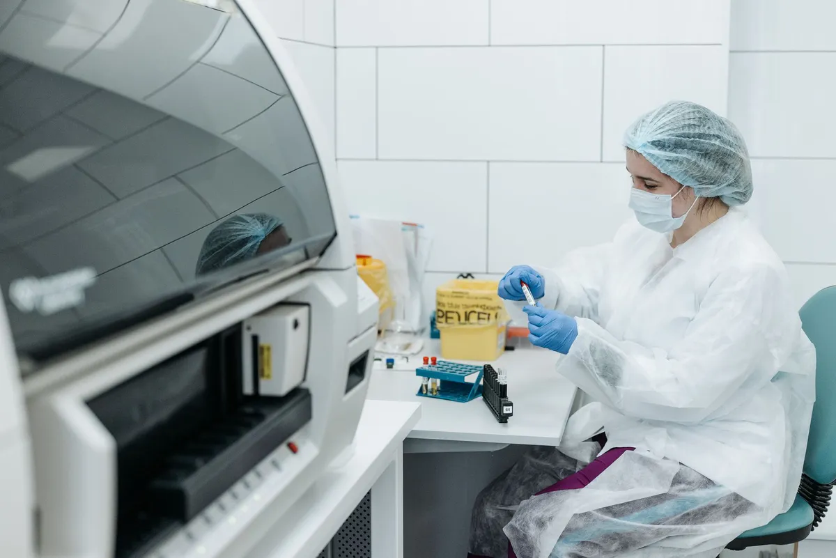 laboratory scientist with DNA