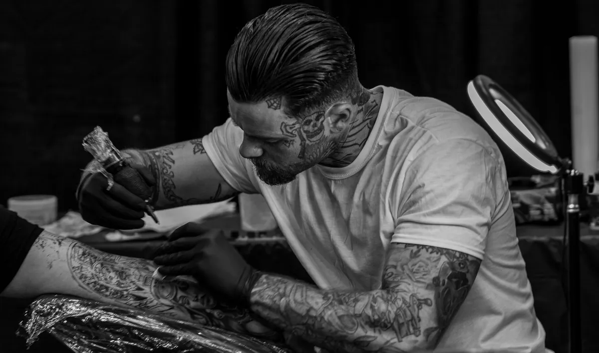 tattoo artist at work