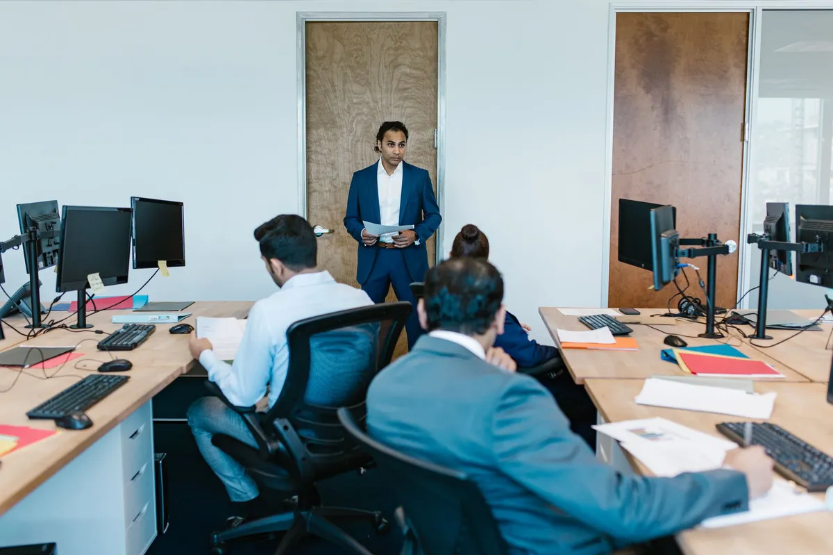 team meeting discussing cybersecurity