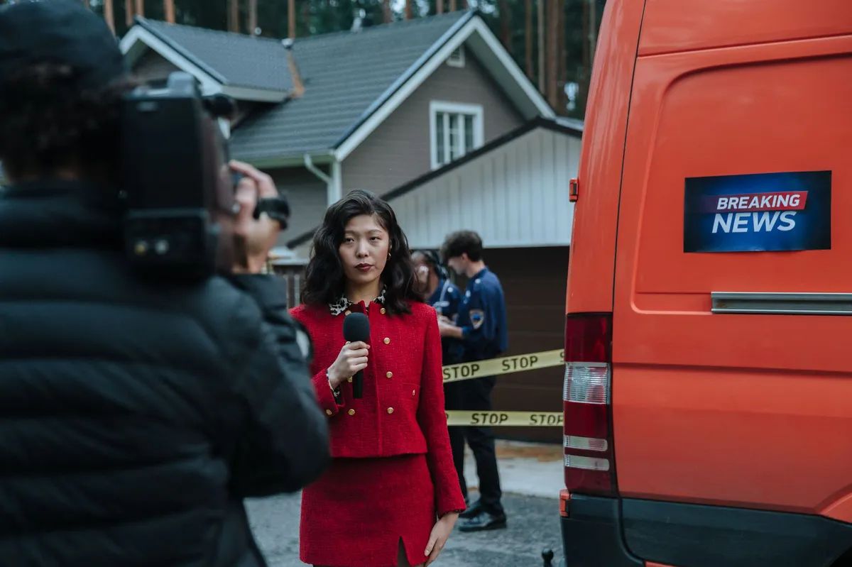 news reporting at a desk