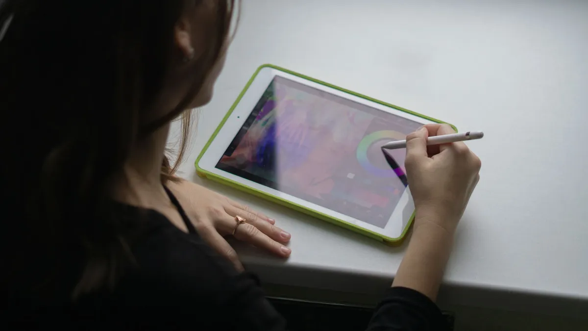 artist using tablet
