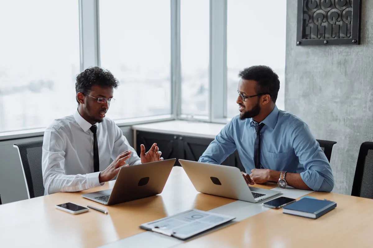 business people discussing technology