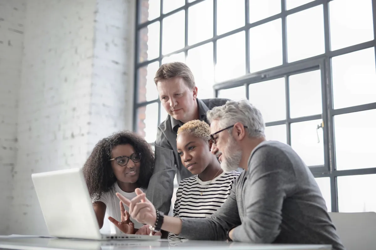 diverse group using technology