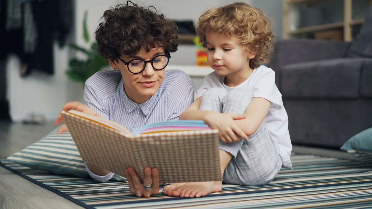 parent and child reading together