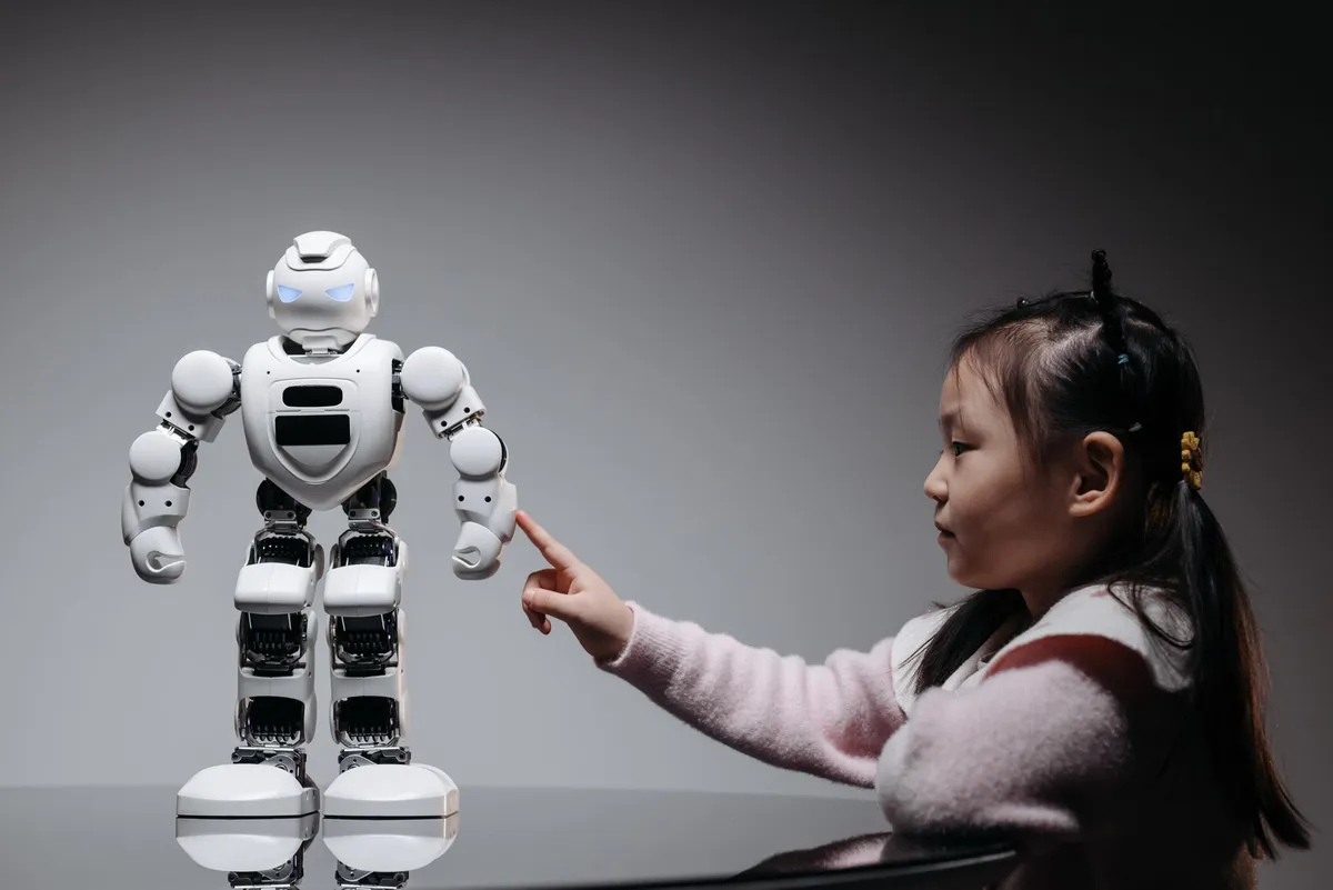 child interacting with AI technology