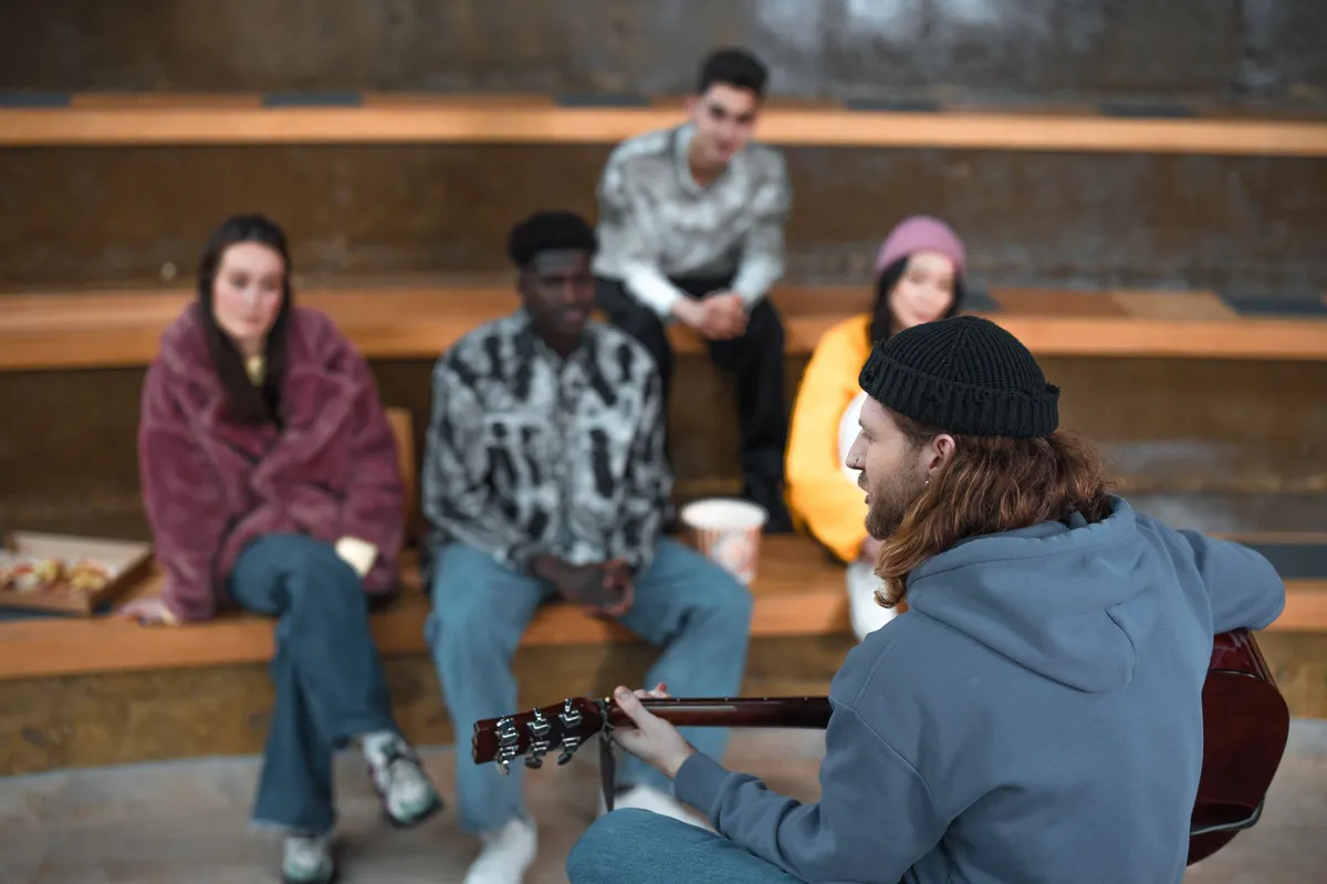 group of friends listening to music