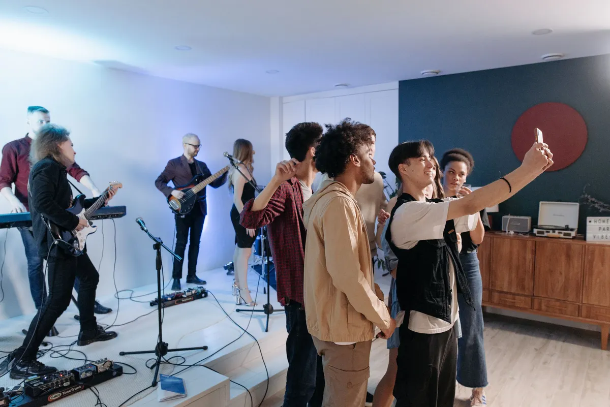group of friends enjoying music