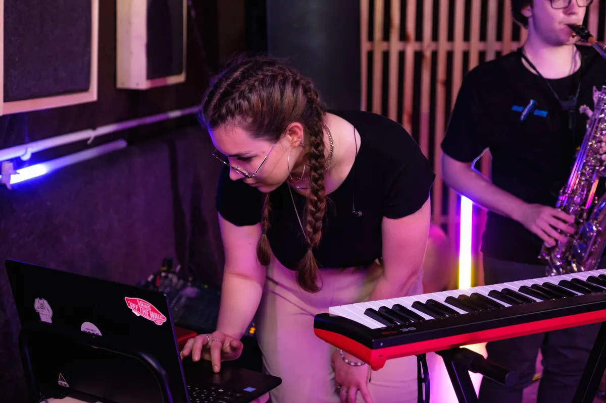 musicians collaborating with technology
