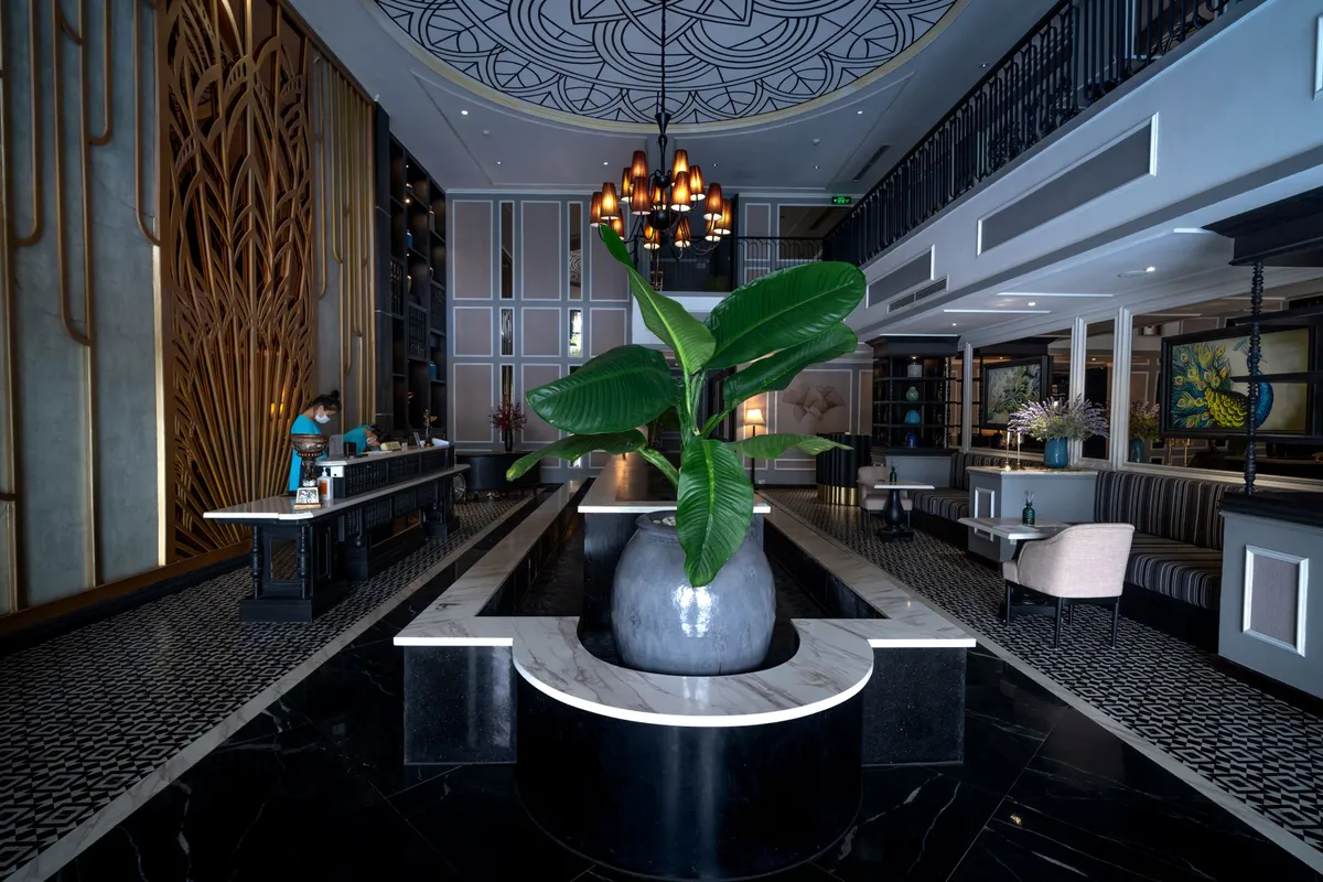 hotel lobby with guests using laptops