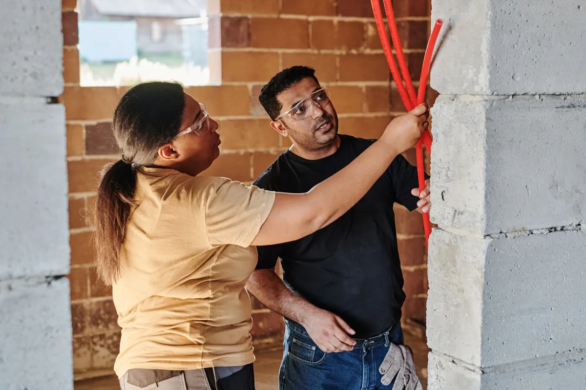 skilled tradespeople collaborating