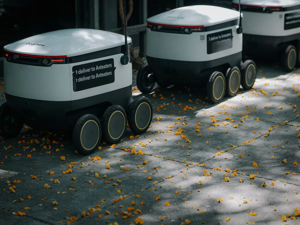 robotic delivery vehicle on city street