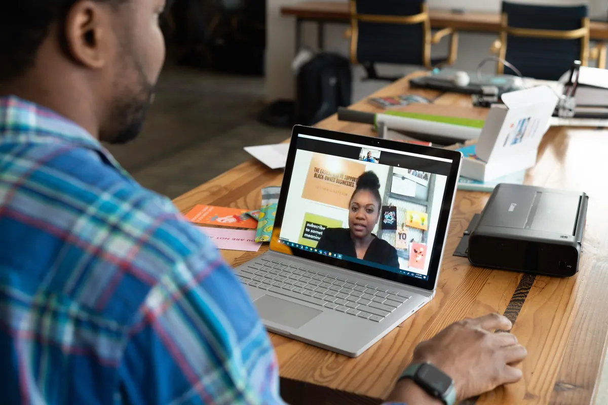 person using laptop for video call