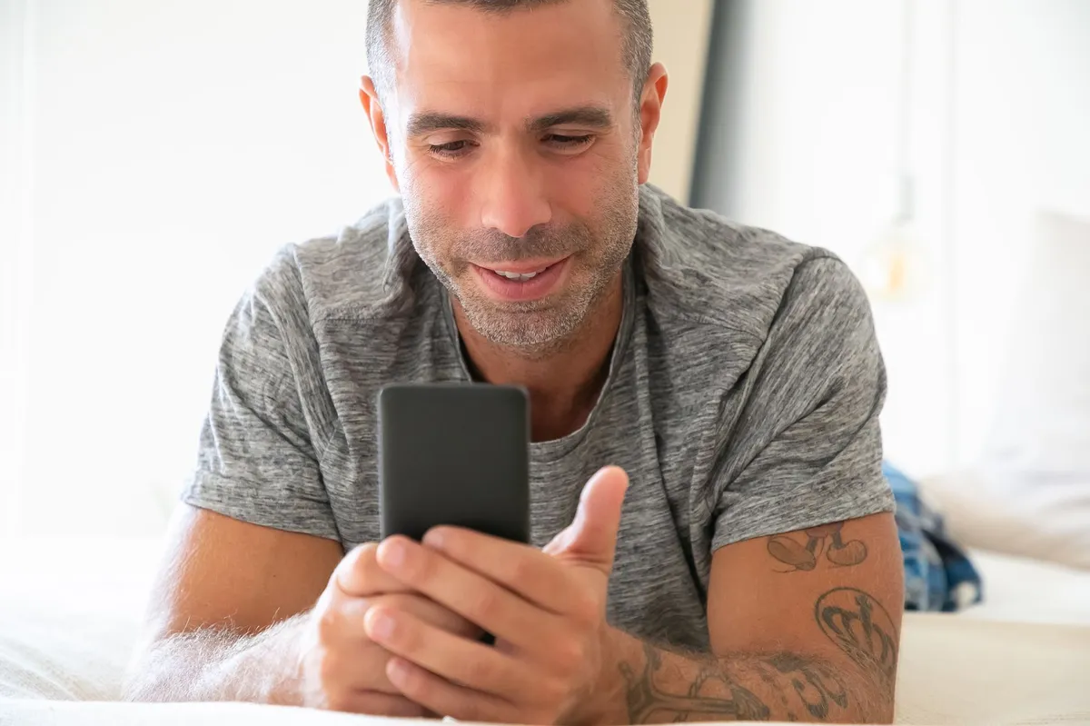 individual using smartphone
