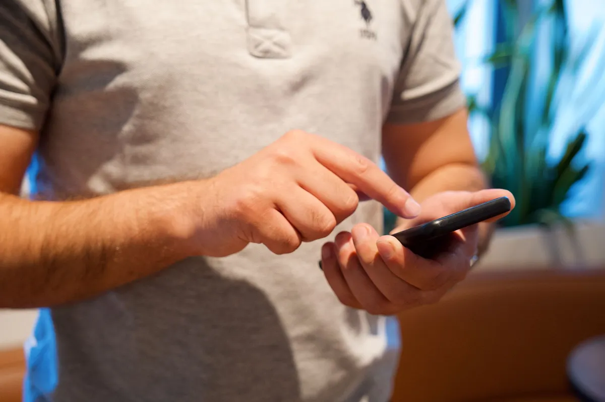 man using smartphone