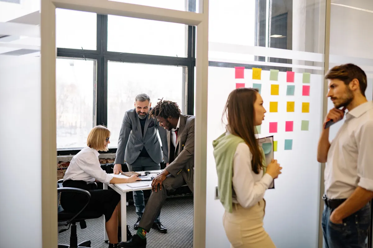 people brainstorming in office