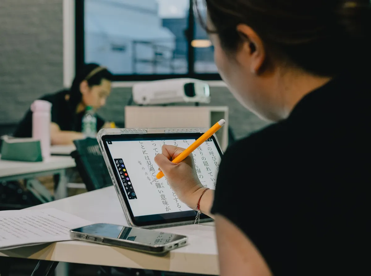 student studying with technology