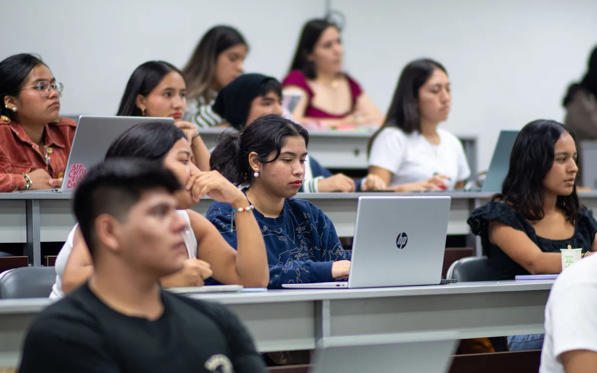 student studying with laptop